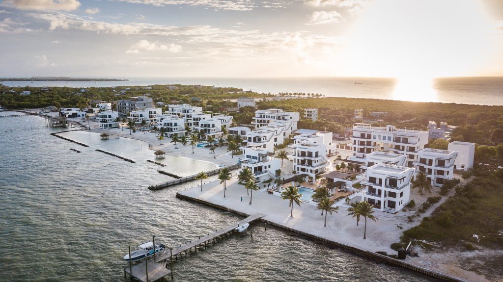 A luxurious beachfront villa at Blu Zen Resort in Caye Caulker, Belize, with stunning ocean views.